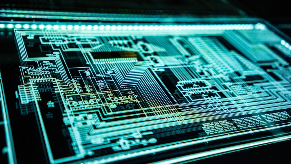 Circuit board lit up in green light